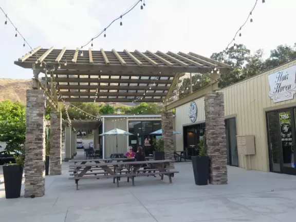 Best playground you'll ever visit! Huge slides, hillside slides, steep grass slope for cardboard sledding, cable zipline, and pretty trees to picnic under.