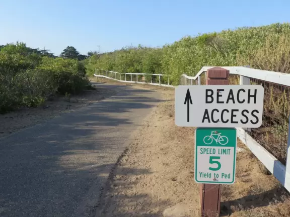 Lovely 0.7 mile walking path through the dunes filled with sage and flowers, past a playground, and behind some houses. Possible 3 mile walk, if you connect to Embarcadero.