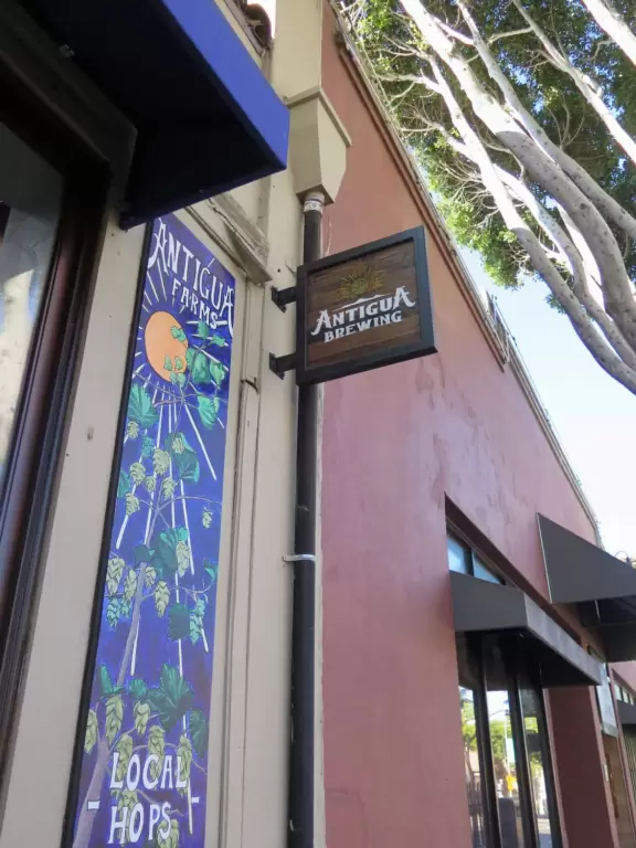 A main street of late 19th century storefronts, popular cafes, and a hip college scene. Recently, suffering an epidemic of homelessness relating to mental health problems.