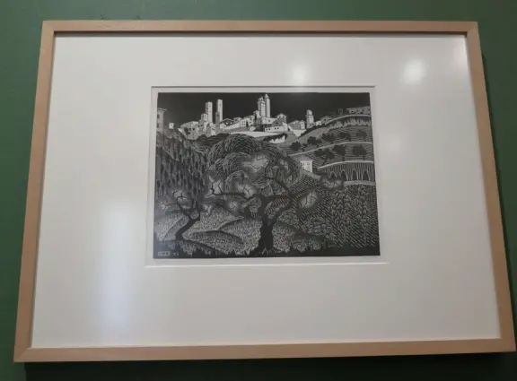 Beautiful palace in square full of trees, with strange and wonderful paintings and illustrations by M. C. Escher.