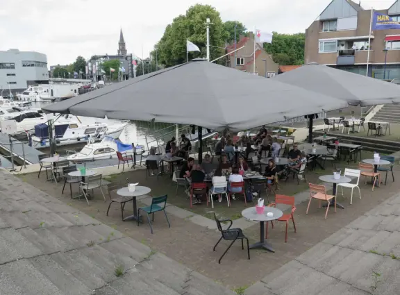 19 windmills that were built around 1740, along a canal, in a barren, wide open area. The windmills were built to pump water to prevent flooding. A touristy activity.