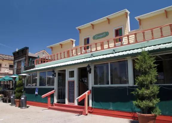 Cute town with wild west buildings and restaurants in Victorian houses.