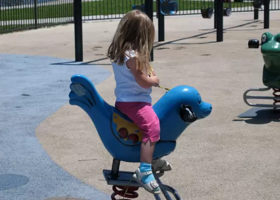 A huge beautiful park with lake, turtle and frog sculptures, lighthouse, boat to climb in, splash pad, workout equipment- you name it they have it! Four play areas!