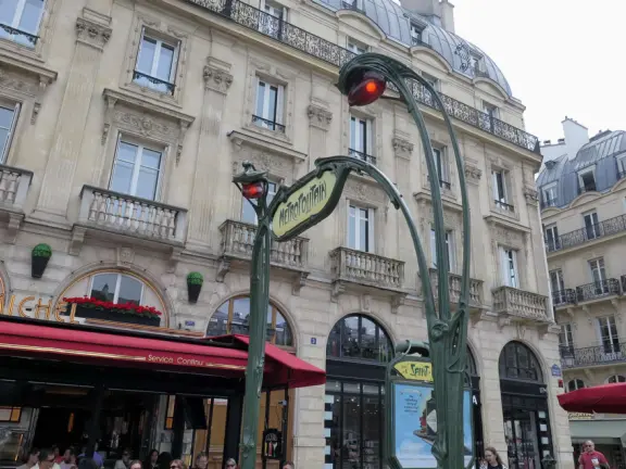 Iconic Gothic church on the Seine river with a huge plaza, Roman ruins, and gardens with play equipment.