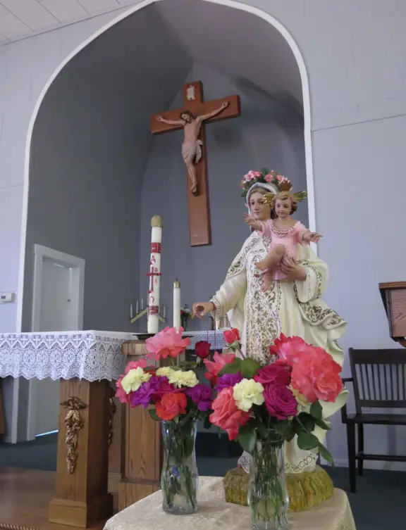 Small town with a few cafes on El Camino Real, some wineries, a sweet chapel, a playground, and pretty trees around houses along I Street.