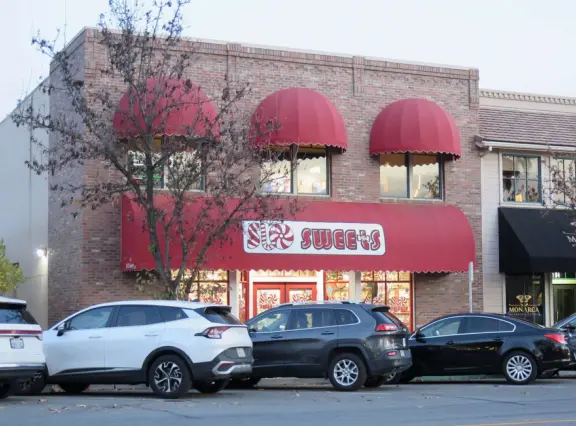 A great walkable downtown with a huge park, amazing playground, and cute stores and cafes.
