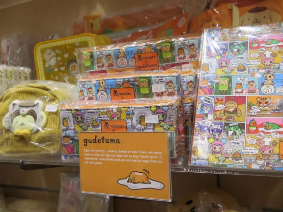 Indoor mall with kids mini train in the center, Target, large movie theater, gourmet food court, and Sanrio store!