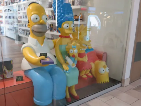 Indoor mall with kids mini train in the center, Target, large movie theater, gourmet food court, and Sanrio store!