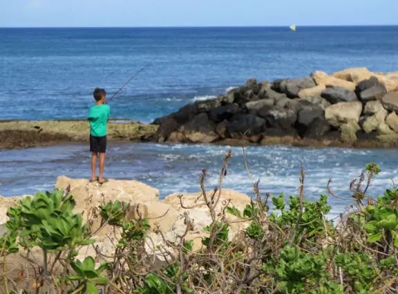 Ko Olina Beach, or KoOlina Beach, has four manmade perfect-looking beaches with calm water where kids can swim and play.