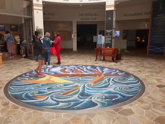 Like a children's museum, with lots of fun hands-on activities and colorful rooms, but plenty of interesting information for adults to read too.