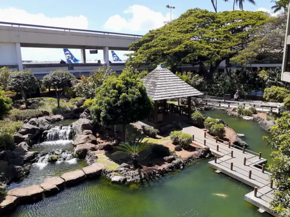 Japanese, Chinese, and Hawaiian gardens where you can wait peacefully for your flight!