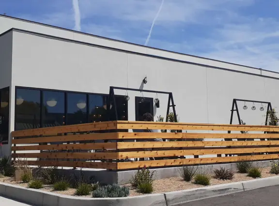 A lovely, hilly street with ocean views, lined with cute cafes.