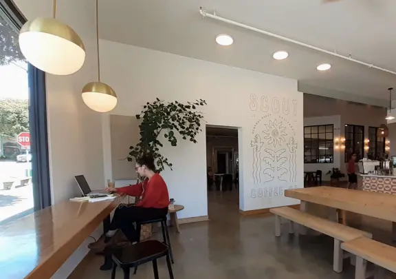 A lovely, hilly street with ocean views, lined with cute cafes.