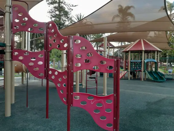 Gorgeous park with grand trees and huge playground.