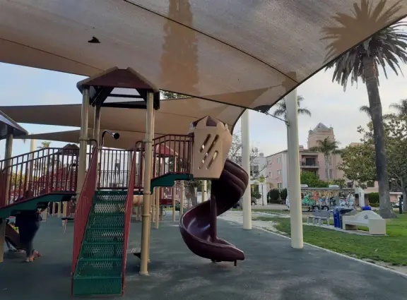 Gorgeous park with grand trees and huge playground.