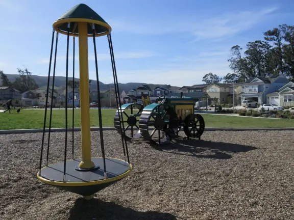 A colorful, fun playground with huge twisty slide, three-level climby, tractor, baby swings, basketball court, and giant lawn. Also called San Luis Ranch.&nbsp;