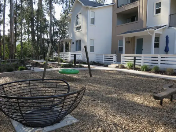 Lovely path beside a eucalyptus forest, on both sides of the creek, with workout stations, in a residential neighborhood. You can walk two miles total. Also called San Luis Ranch.