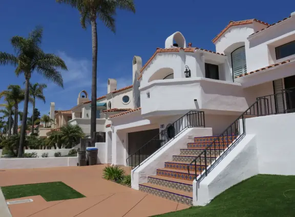 Hillside park with sloped lawn going way down, marvelous pampas grass, and a small playground.