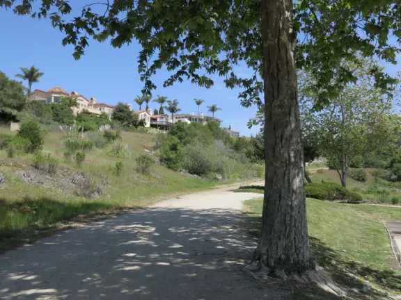 Incredible playground in a warm valley, with a pretty trail to walk.