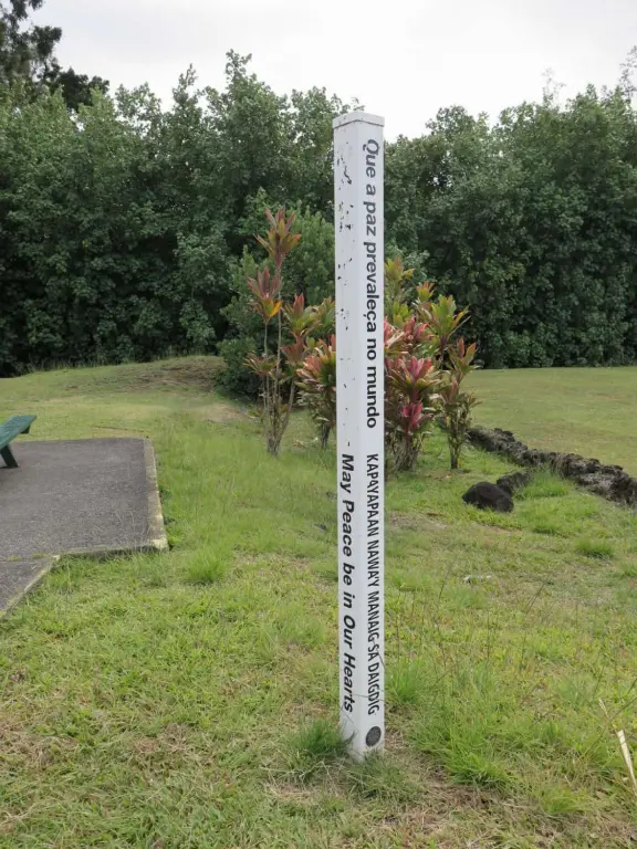 Small park with picnic tables, and views across the water to Reeds Bay Beach Park.