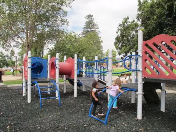 Large open space with views of mountains, toddler playground, and huge skatepark!