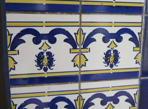 A gorgeous public garden under high mountain ridges, with dwellings representing the many cultures that are found in Maui: Portuguese, Chinese, Japanese, Filipino, Hawaiian, and New England.