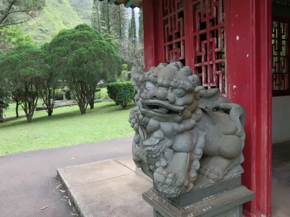 A gorgeous public garden under high mountain ridges, with dwellings representing the many cultures that are found in Maui: Portuguese, Chinese, Japanese, Filipino, Hawaiian, and New England.