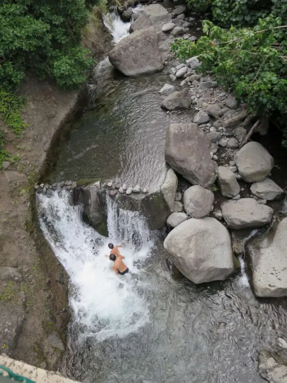 At Iao Valley State Park, the upper path takes you to views of Iao Needle, and the lower path takes you to a magical area by the stream with boulders and large tropical trees. Reservation required.