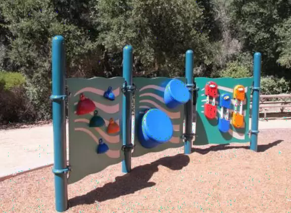 A beautiful pine-filled park with two playgrounds and a skate park.