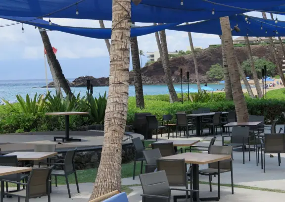 A long beach with clear water like gelatin, backed by older resorts with lovely grounds and a 2.7 mile beachfront path!