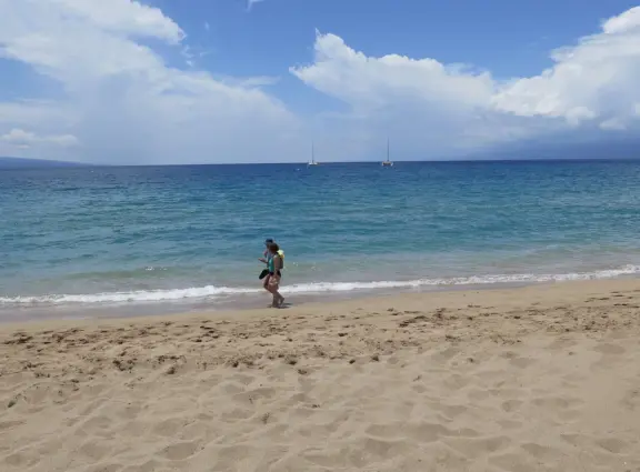 A long beach with clear water like gelatin, backed by older resorts with lovely grounds and a 2.7 mile beachfront path!