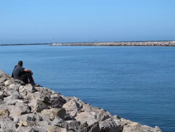 A pretty patch of sand by a boardwalk in Channel Islands Harbor.