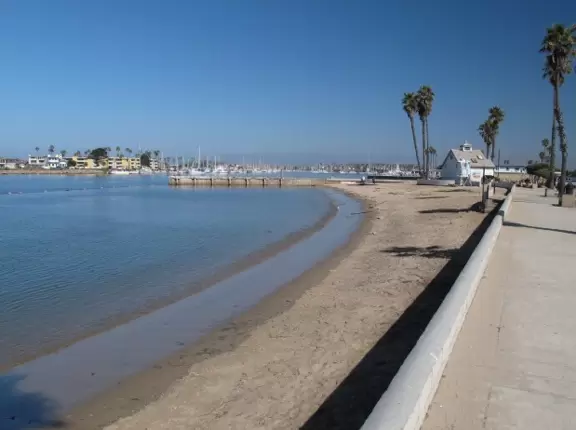 A pretty patch of sand by a boardwalk in Channel Islands Harbor.