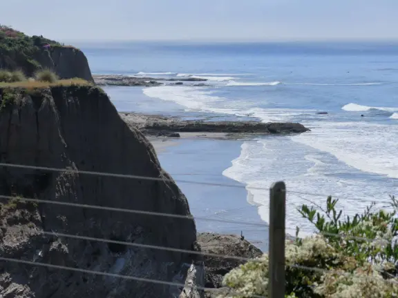 Walkway on the cliffs, in front of the resorts, that's bliss at sunset and in springtime when there are flowers galore. Take stairs down to a sheltered cove with tide pools.