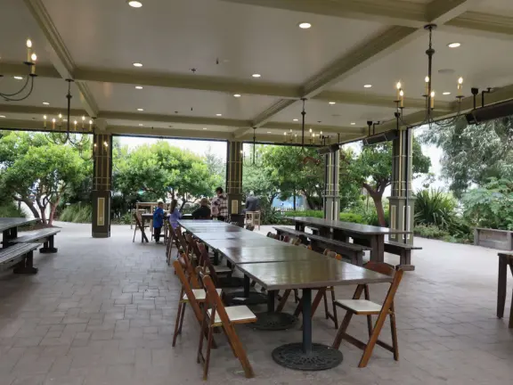 A pretty beachside town, with a wooden pier and wide windy beach with perfect views of Morro Rock, and colorful houses with gardens, backed by gently-sloping hills.