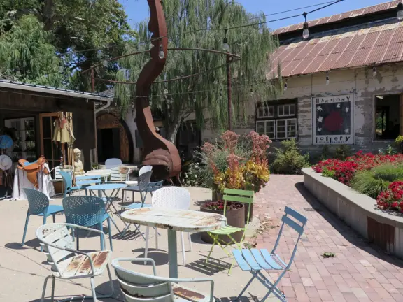 Adorable spot along Highway 1, with creamery food truck, lunch food truck, amazing glassworks store, pottery store, leather store, and peaceful Irish chapel.