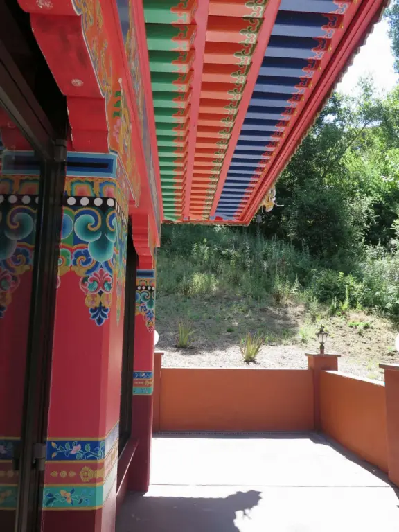 The public can come and walk the trail, turn the three prayer wheels, see the red temple and meditation hall, ring the chimes and gongs, and admire the sculptures.