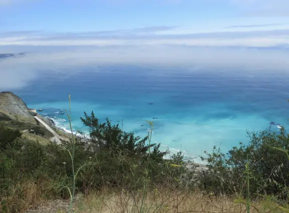 Breathtaking stops along the way, of vertical cliffs and sparkling blue-green water, a lighthouse (reserve online), redwood gulches, swimming holes, stunning beaches, and New Camaldoli Monastery.