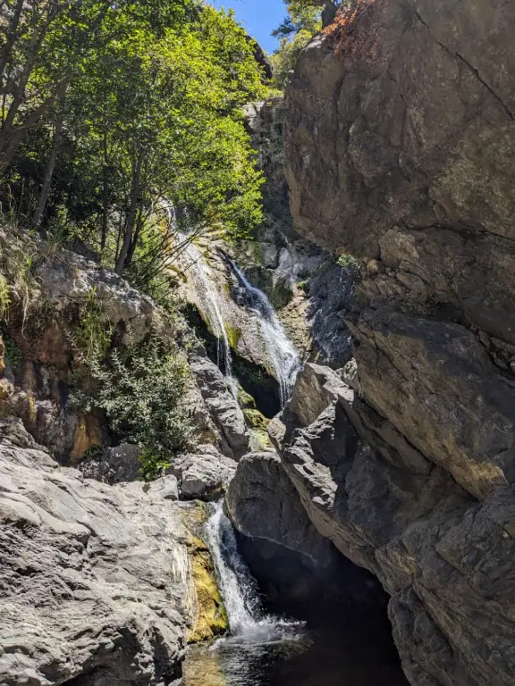 A very short hike in to huge boulders, bright trees, waterfalls, and a clear-water swimming hole. There is a longer hike, if you take the right fork.