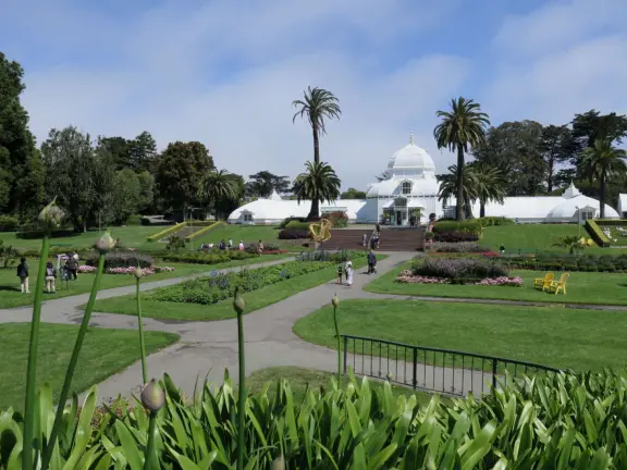 Glass-enclosed garden of unique and interesting tropical plants and flowers that the whole family loves! Gorgeous building on a hill, above formal gardens.