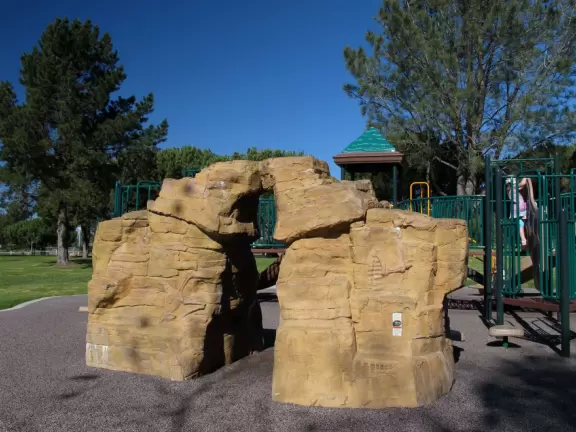 Huge park that feels like a retreat in the woods- playgrounds and pond with ducks!