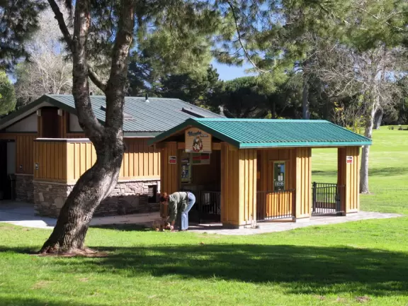 Huge park that feels like a retreat in the woods- playgrounds and pond with ducks!