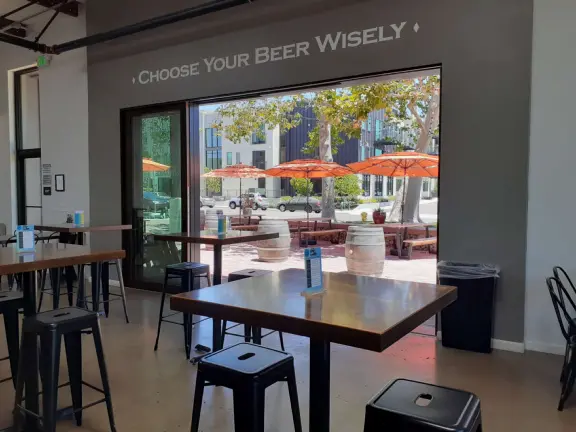 Bike path with views of hills all around, and pretty neighborhood nearby.