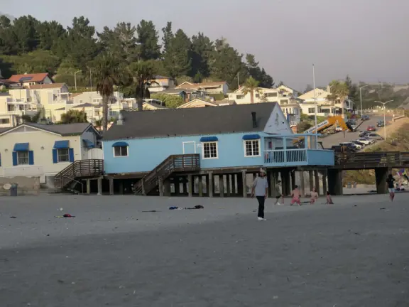 Colorful, pretty main street and boardwalk, with great cafes, lovely ship playground, and mesmerizing yellow cliffs.