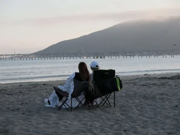 Colorful, pretty main street and boardwalk, with great cafes, lovely ship playground, and mesmerizing yellow cliffs.