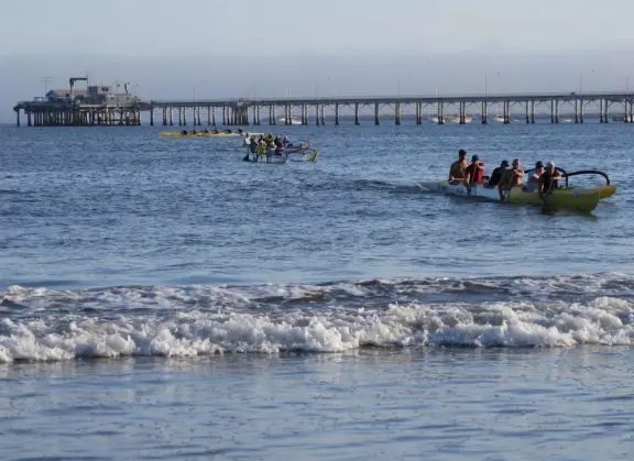 Colorful, pretty main street and boardwalk, with great cafes, lovely ship playground, and mesmerizing yellow cliffs.