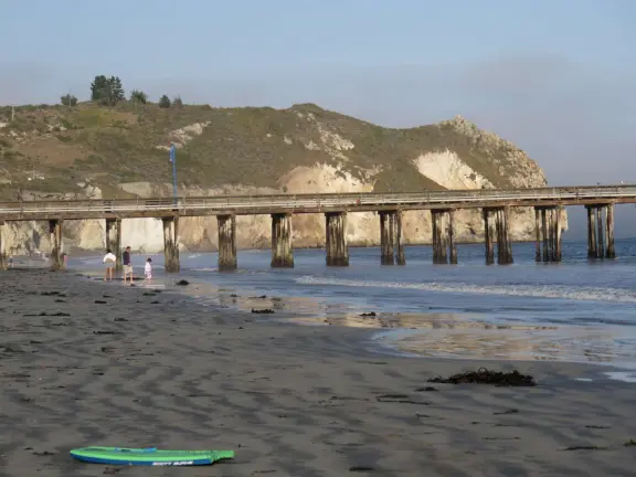 Colorful, pretty main street and boardwalk, with great cafes, lovely ship playground, and mesmerizing yellow cliffs.