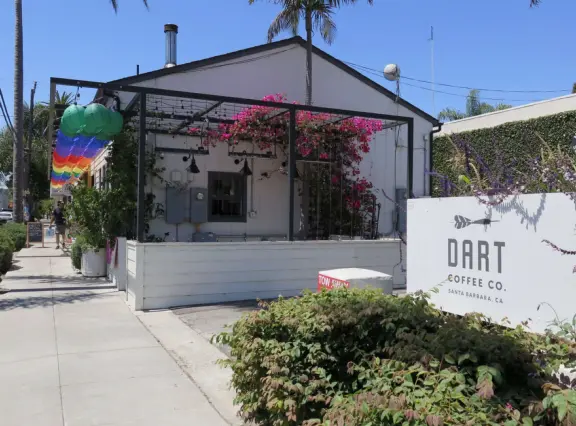 Hip area with wine bars, cafes, and bakeries, where you can sit on a patio surrounded by ivy-covered walls.