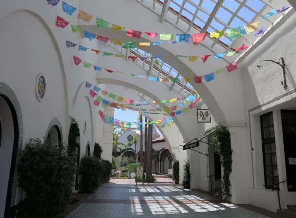 A pedestrian-only area on State Street with sidewalk cafes, good shopping, and colorful Spanish architecture.