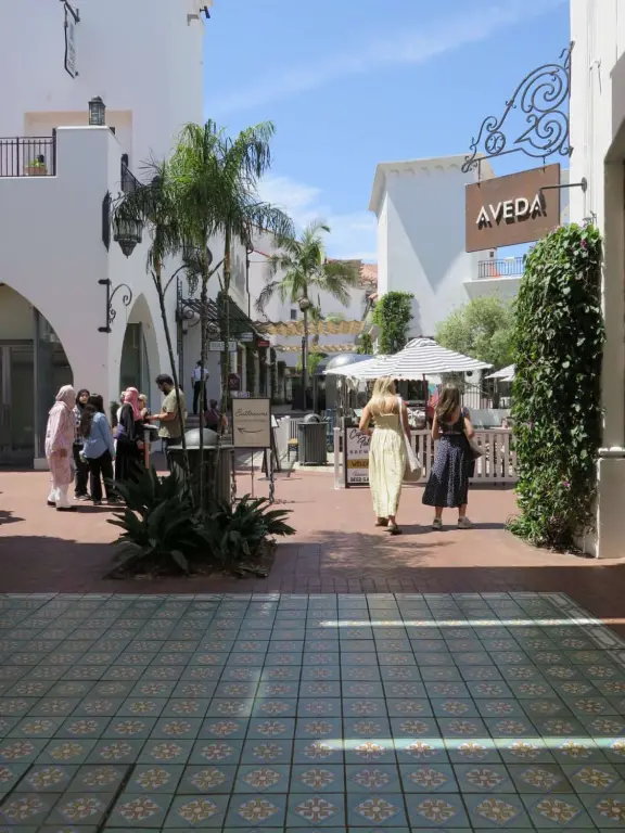 A pedestrian-only area on State Street with sidewalk cafes, good shopping, and colorful Spanish architecture.